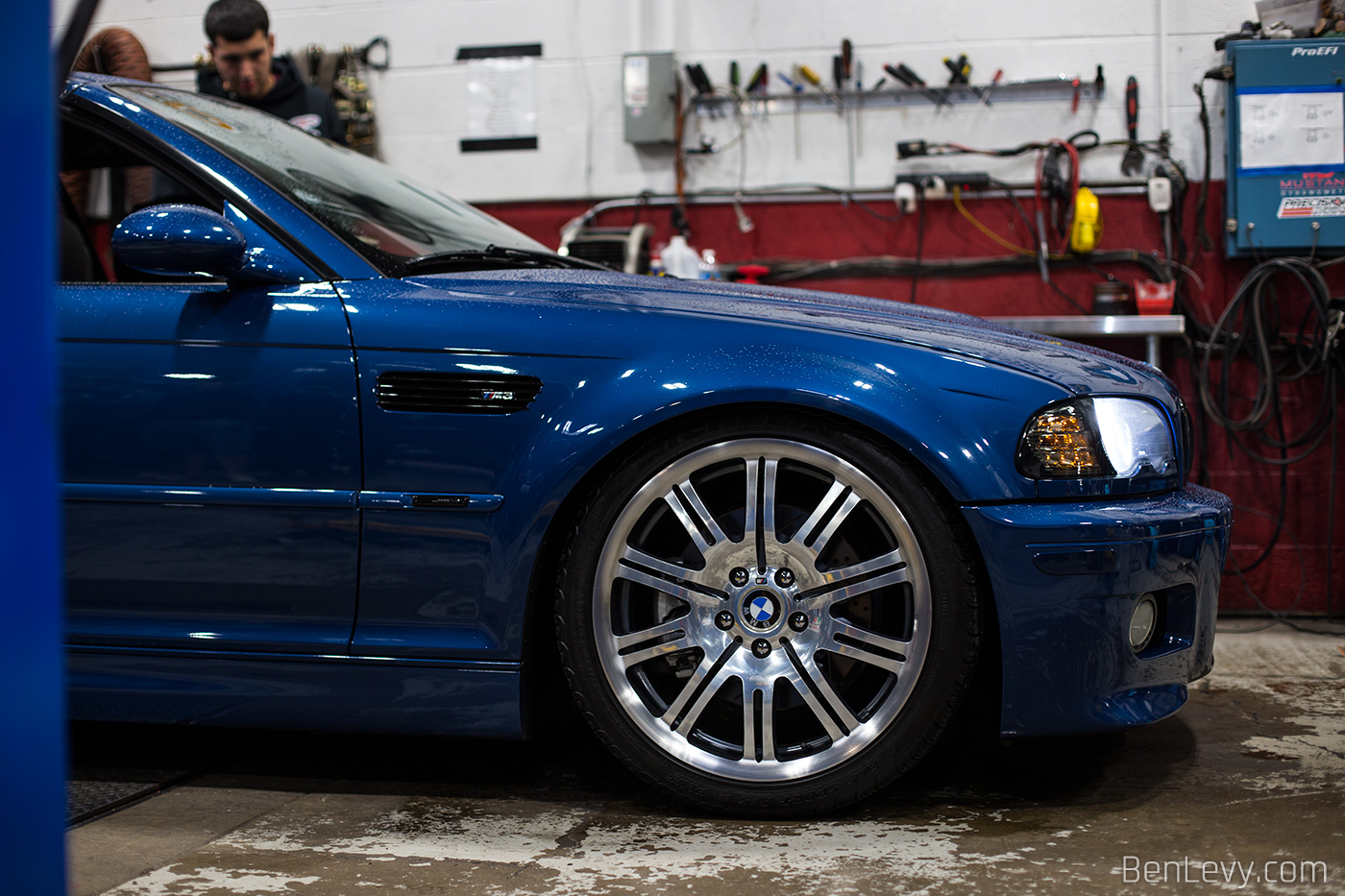 Front Fender of a Wet BMW M3