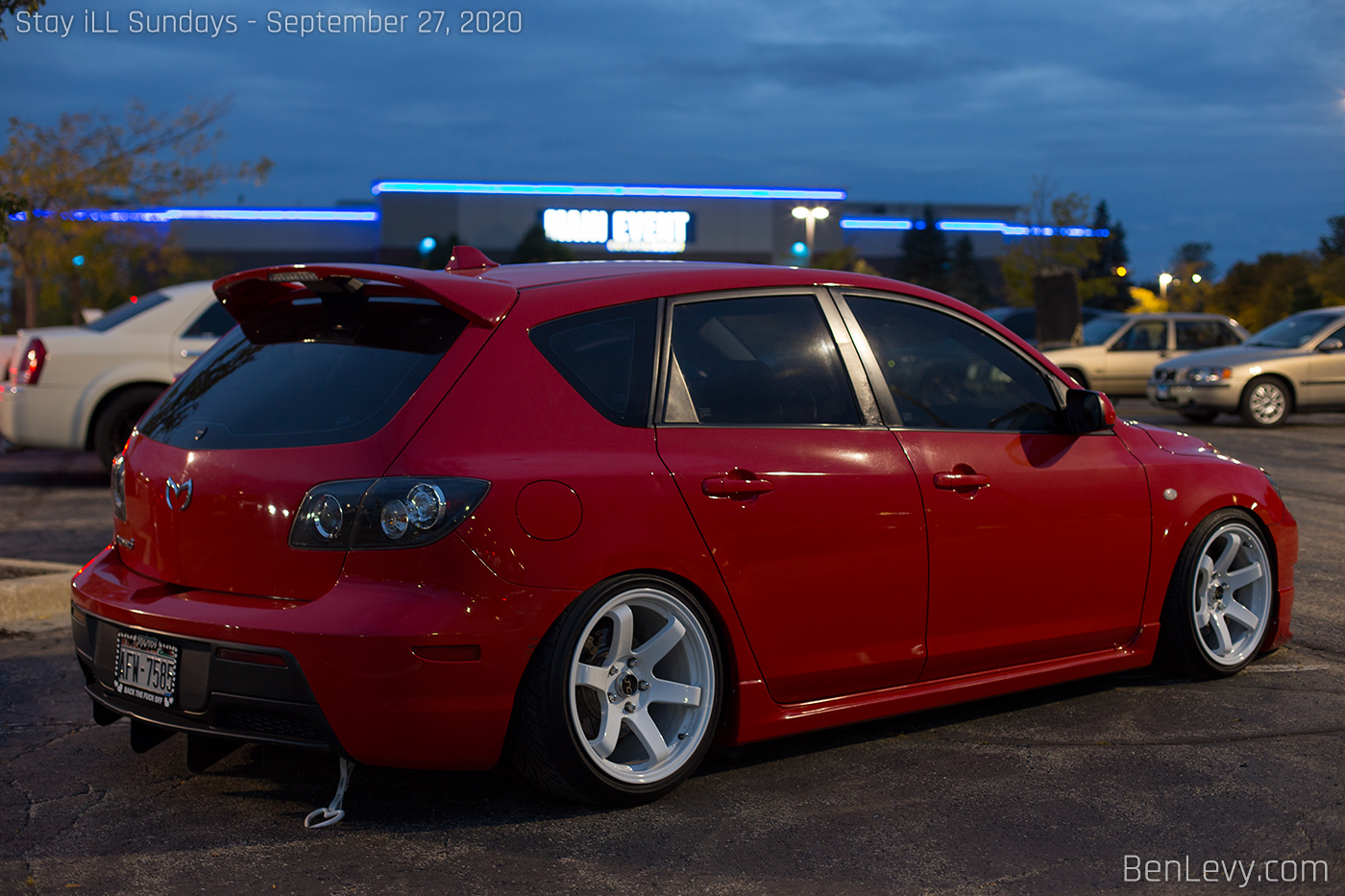 Red Mazdaspeed3 with JNC014 wheels