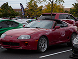 Red Toyota Supra with Rough Paint