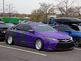 Front of Toyota Camry wrapped in purple