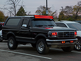 Black Ford Bronco XLT with red LED lights