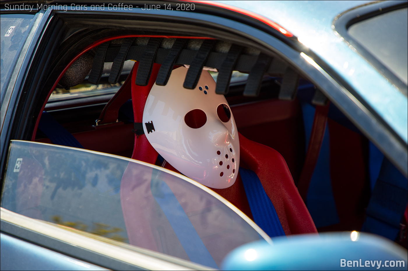 Jason mask in a Ferrari