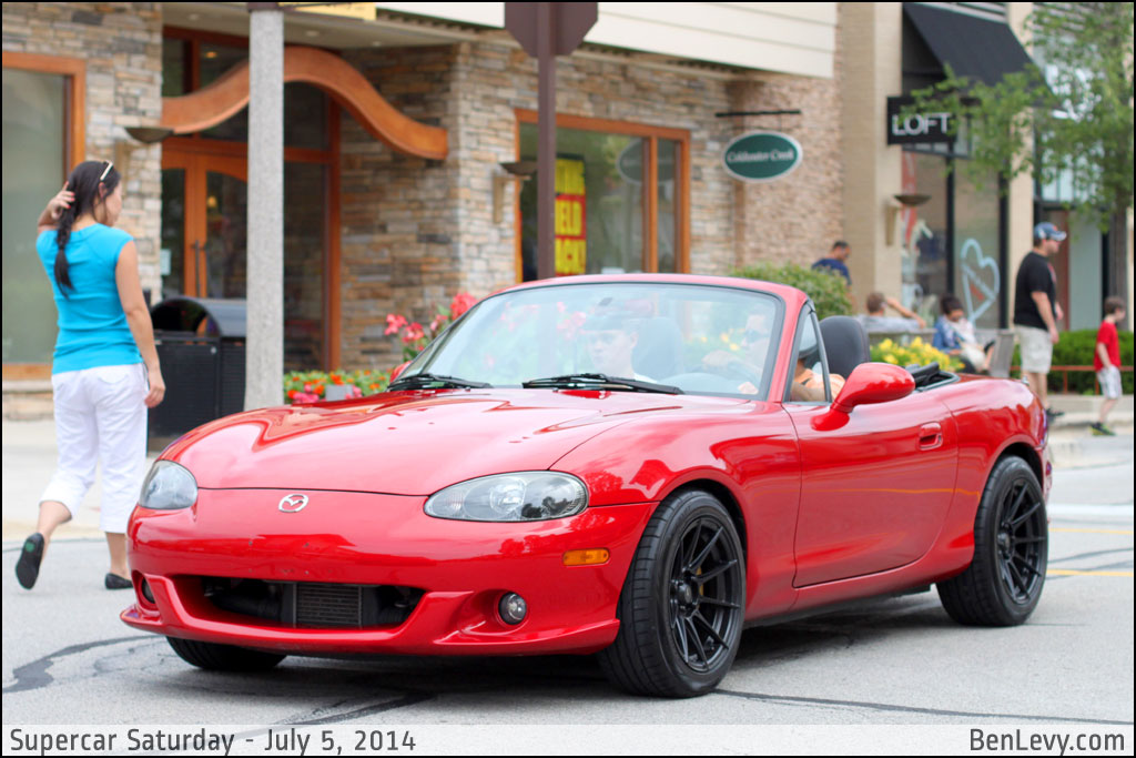 Red Miata with top down