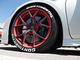 Black on Red Acura NSX wheel
