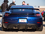 Tailights of a Blue Porsche Cayman GT4