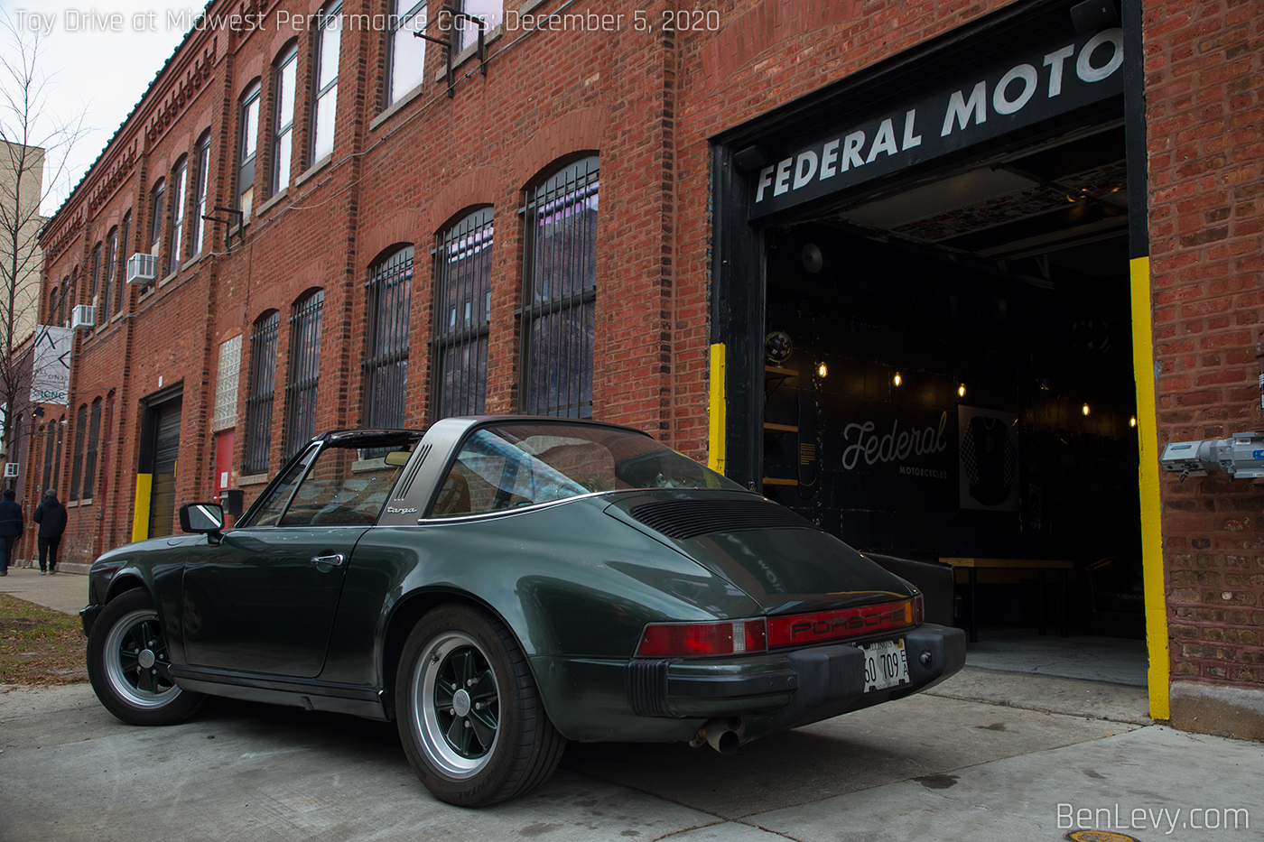 Green Porsche 911 outside of Federal Moto Chicago