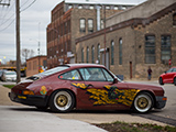 Burgundy Porsche in a Warehouse District of Chicago