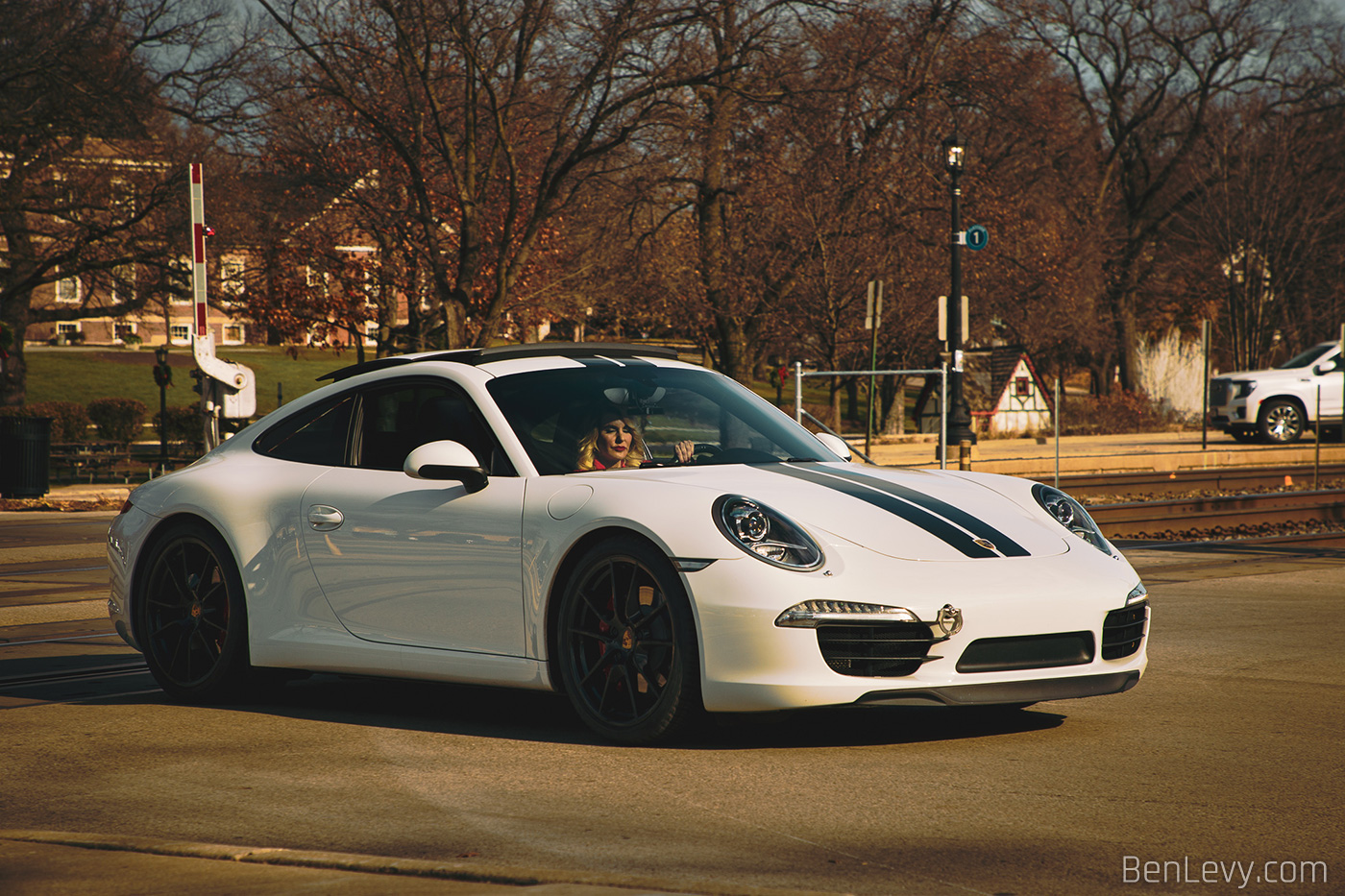 White Porsche 911 by the train tracks in Hinsdale