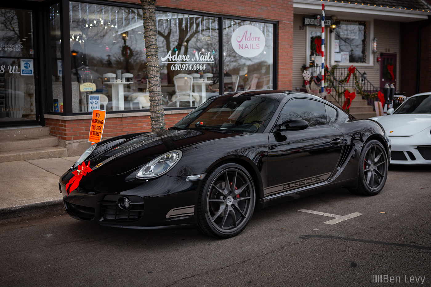 Black Porsche Cayman in Hinsdale for Toy Drive