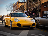 Yellow Porsche 911 Turbo at Burdi Clothing