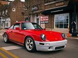 Red Porsche 911 with Grey Bumper
