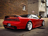 Red Acura NSX parked in an alley in Hinsdale