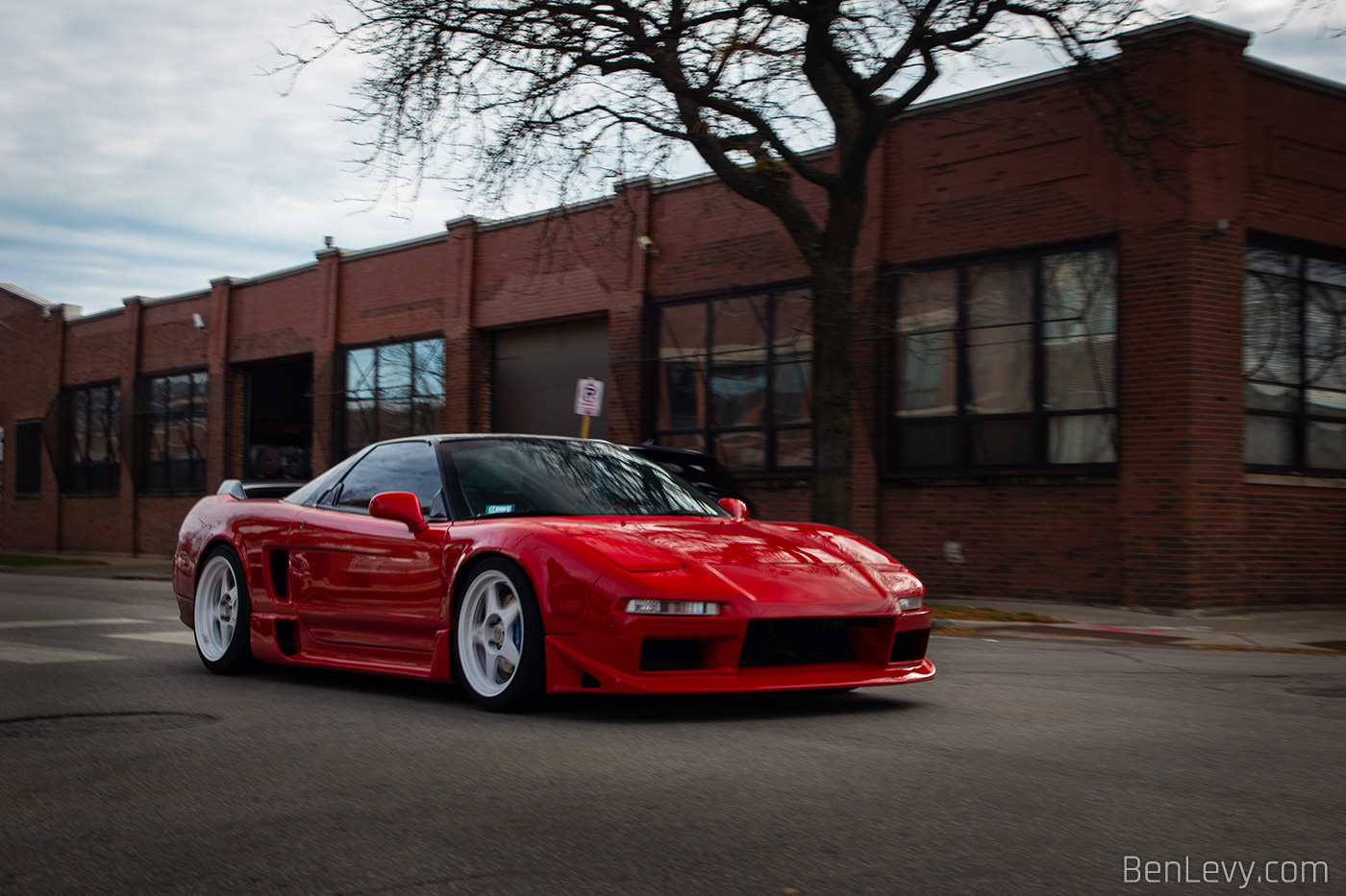 Red Acura NSX leaving Midwest Performance Cars in Chicago