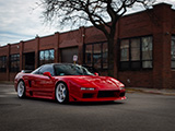 Red Acura NSX leaving Midwest Performance Cars in Chicago