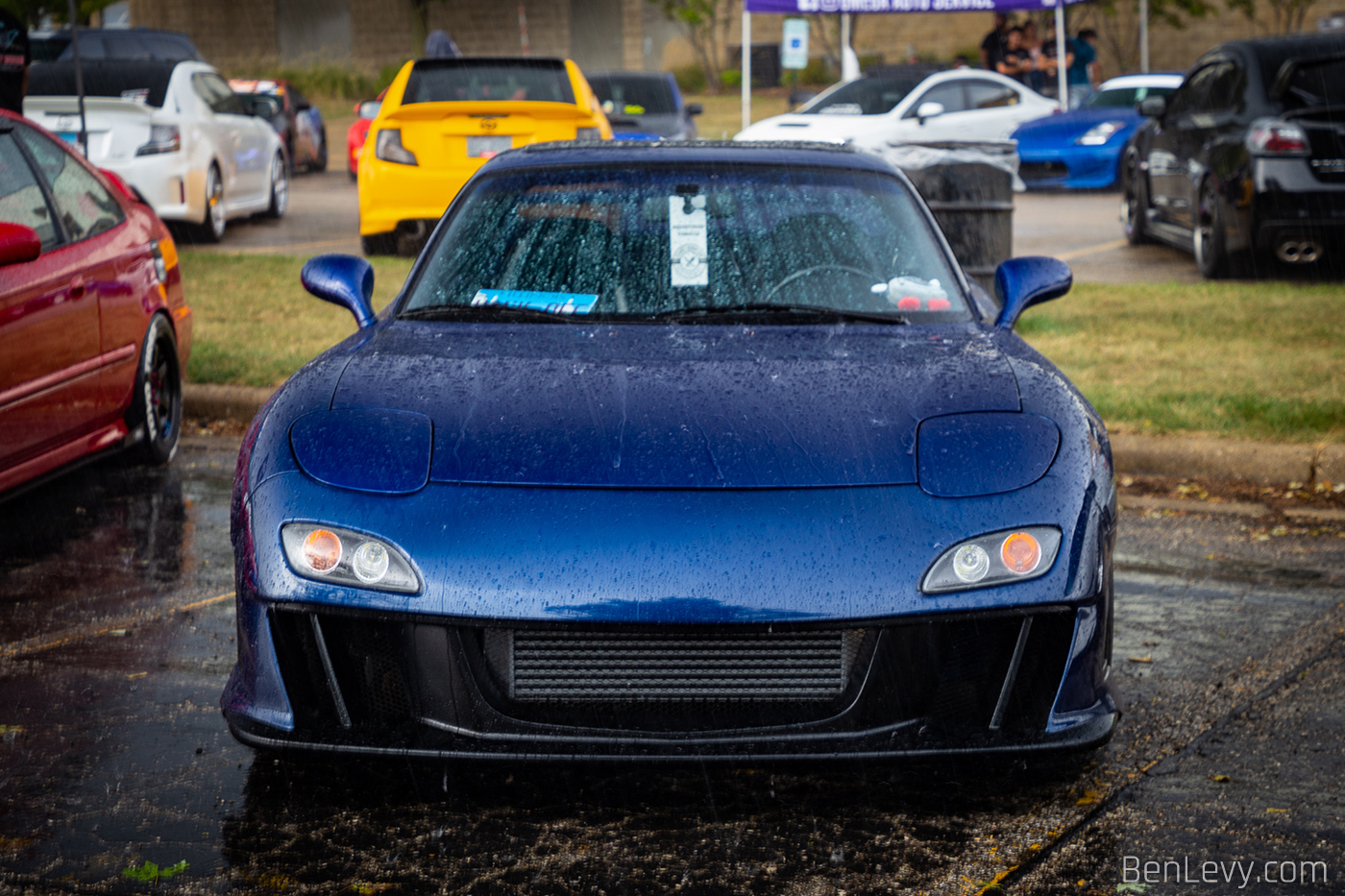 Blue Mazda RX-7 in the Rain