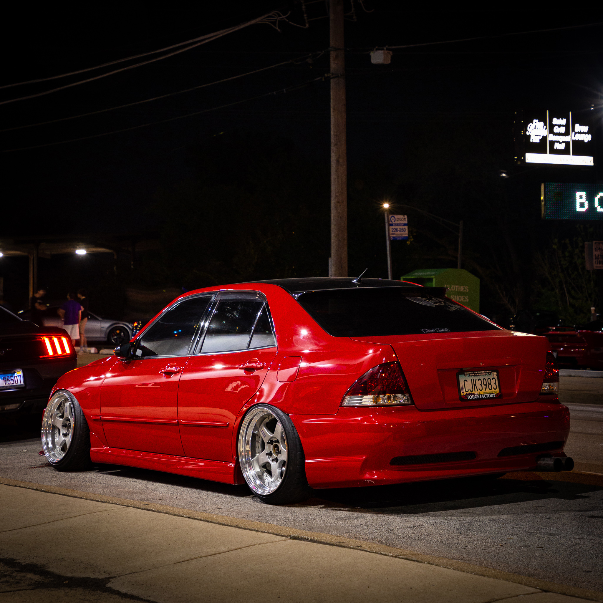 Red Lexus IS300 Parked at Night
