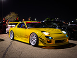 Yellow JDM Mazda RX-7 at Tuners and Tacos Meet