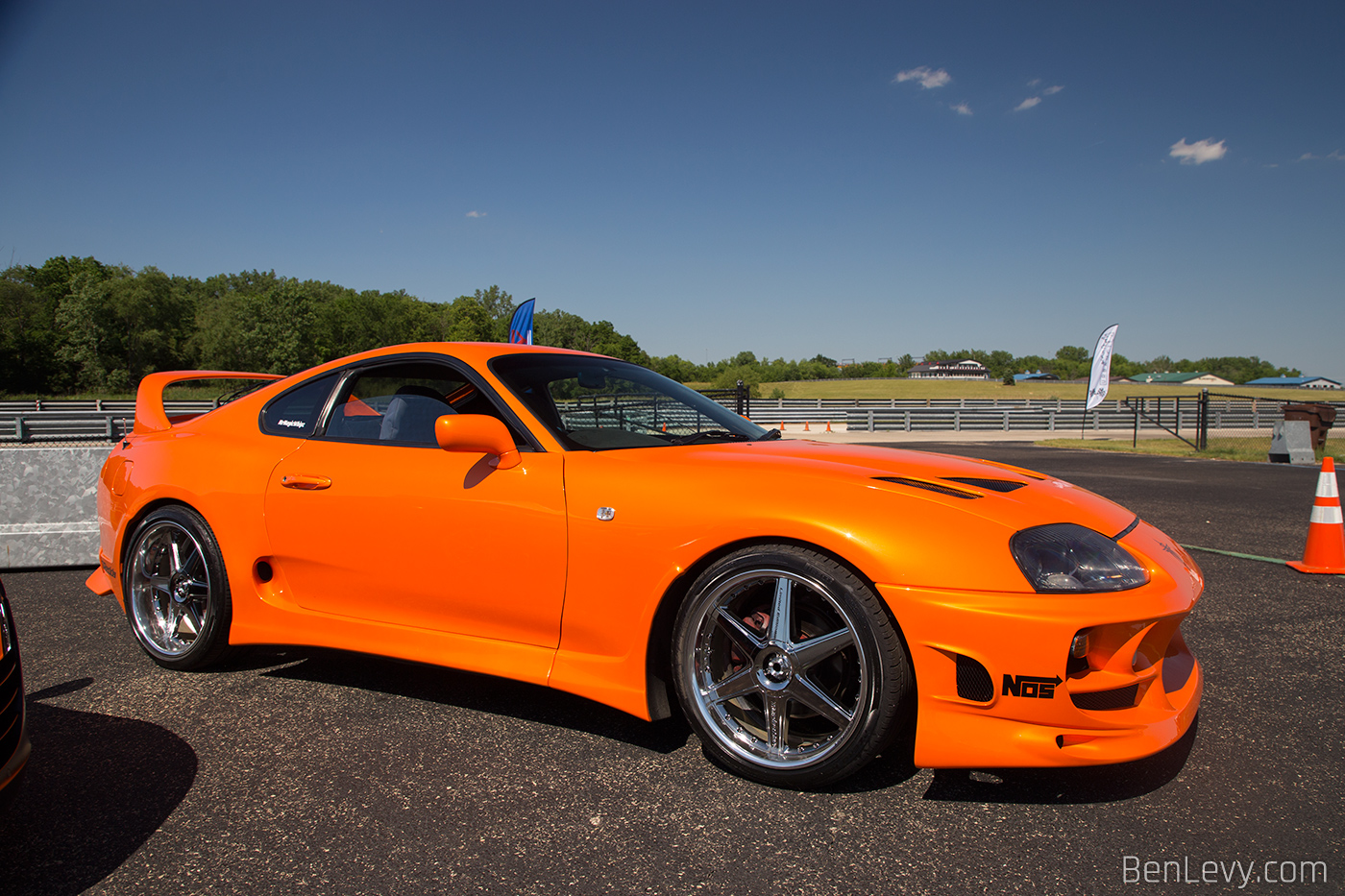 Orange Toyota Supra with Racing Hart Type CR Wheels