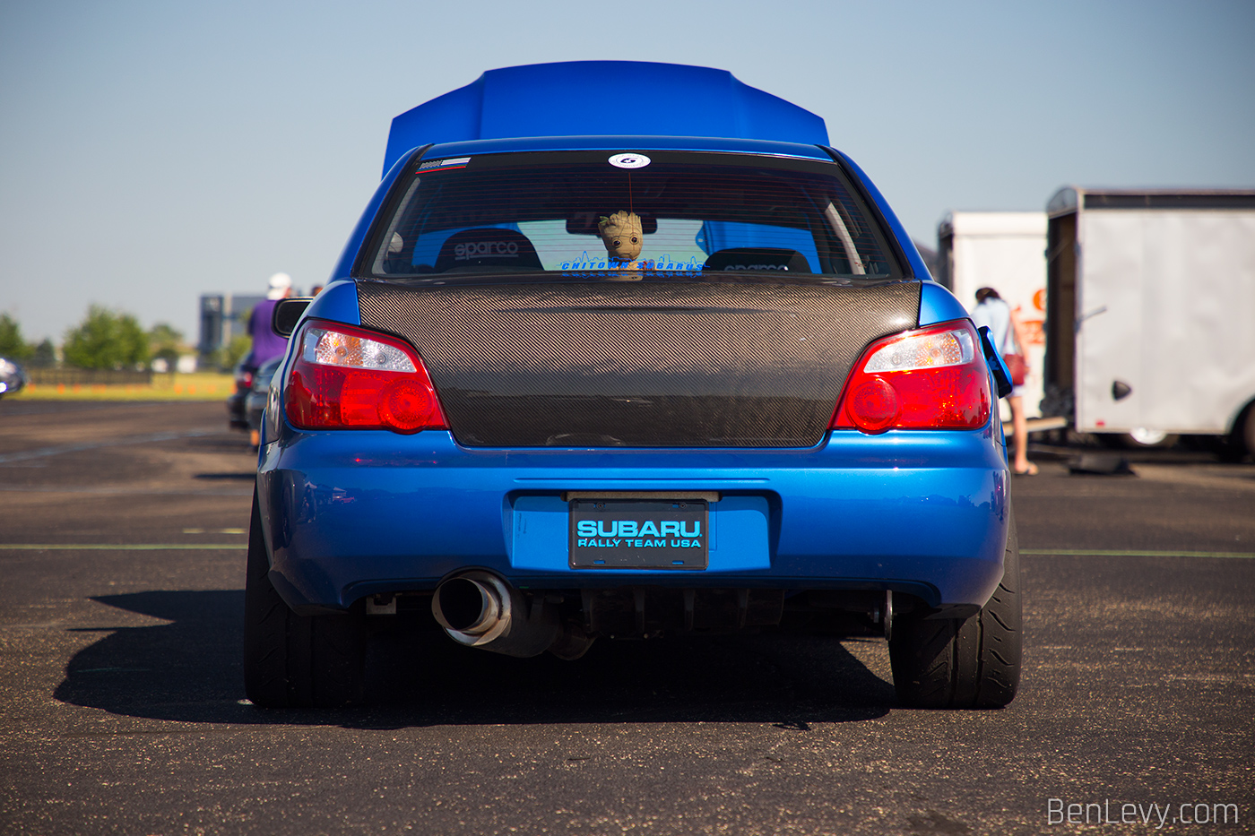 Blue Subaru WRX STI with Groot in back