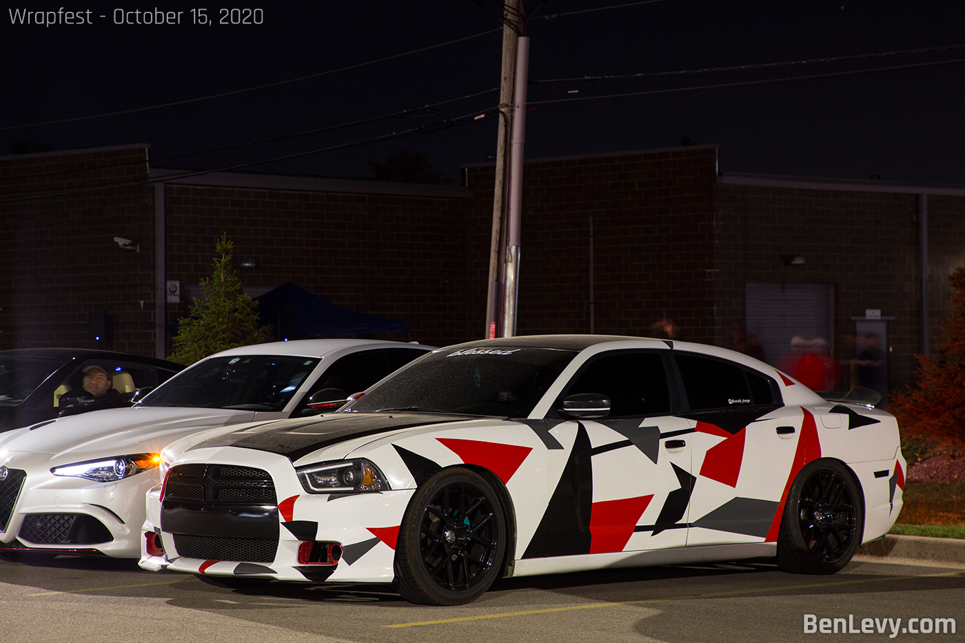 Red, white, and black graphics on Dodge Charger