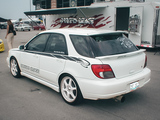 White Subaru WRX with Drivers Image Tuning Shop