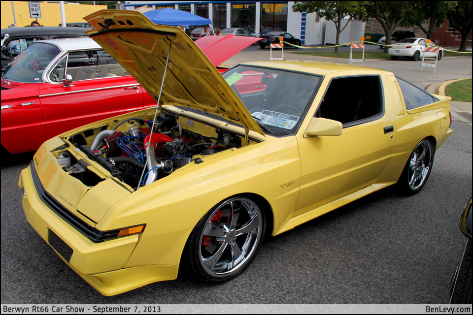 Yellow Chrysler Conquest TSi