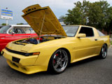 Yellow Chrysler Conquest TSi