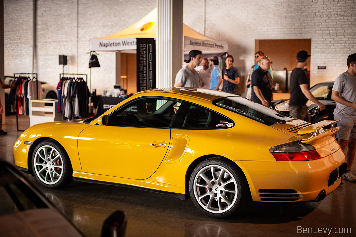 Yellow Porsche 911 Turbo on display at Checkeditout Chicago