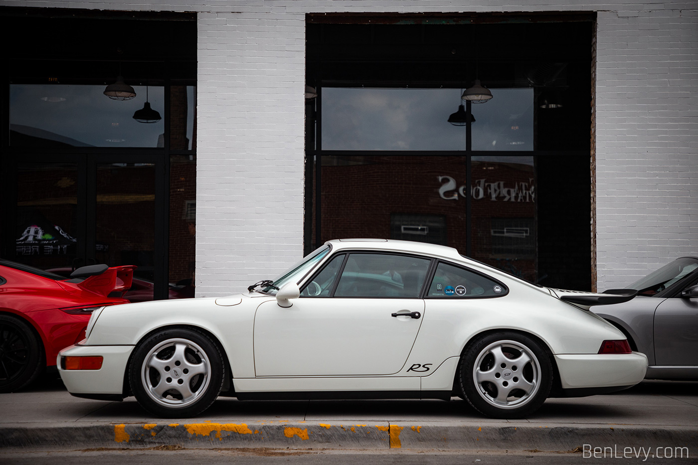 Profile of White Porsche 911 RS America