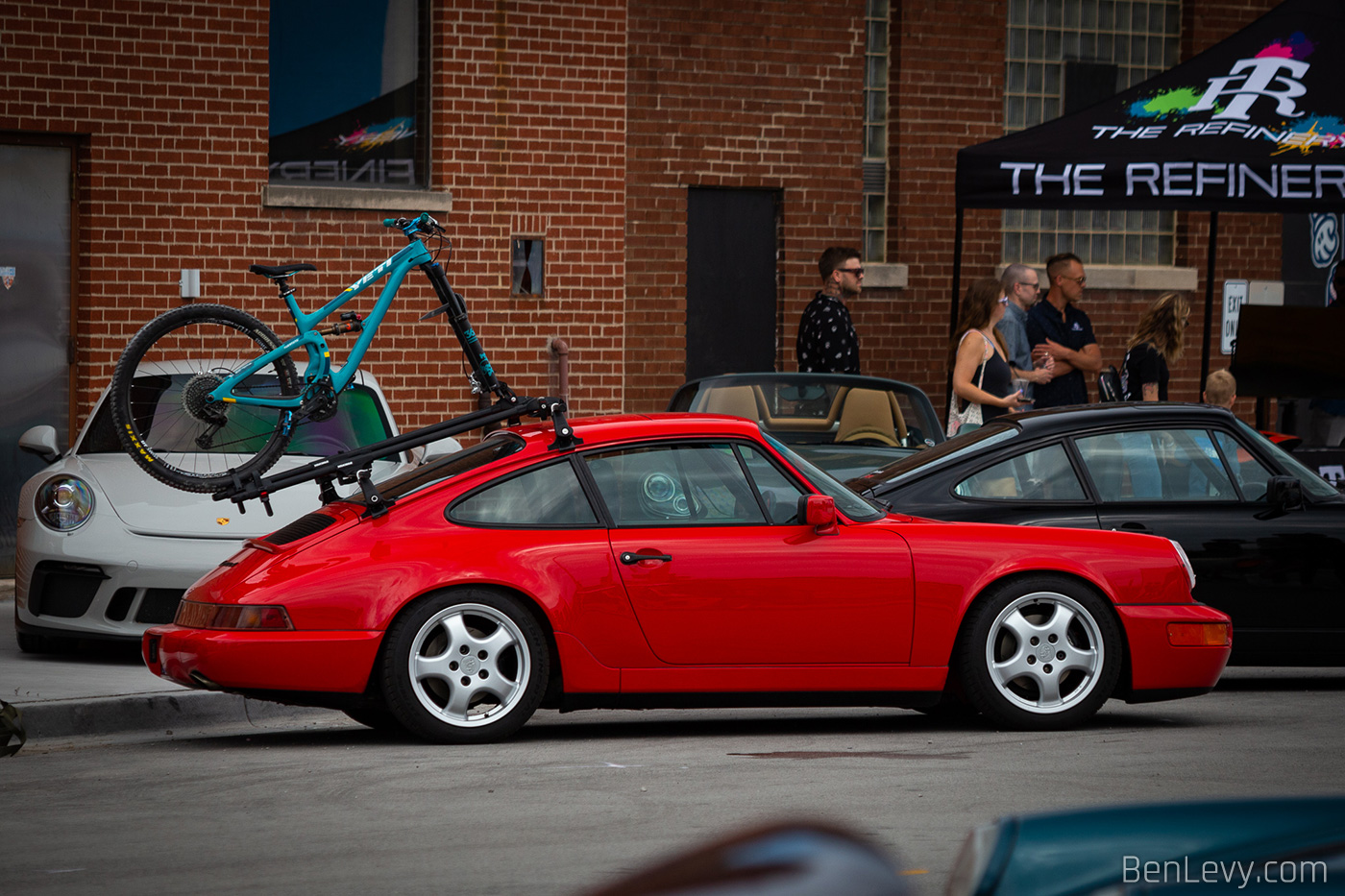 Red Porsche 911 (964) with bike rack