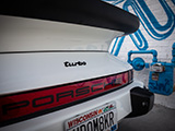 Turbo Badge Over Porsche 930 Taillight Lens