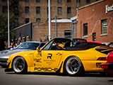 Yellow Widebody Porsche 911 with Top Down