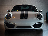 Front of White Porsche 911 with Black Stripes