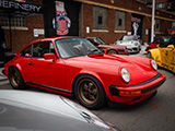 Red Porsche 911 on Bronze Fuchs