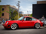 Red Porsche 911 Carrera at Check21