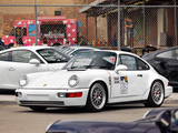 White Porsche 911 with Roads United sticker