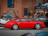 Red Porsche 911 (964) with bike rack