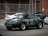 Lifted Black Porsche 911 with Green Stickers