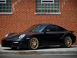 Black Porsche 911 Turbo on Gold Wheels