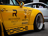 Porsche Logo Under Door of Yellow 993