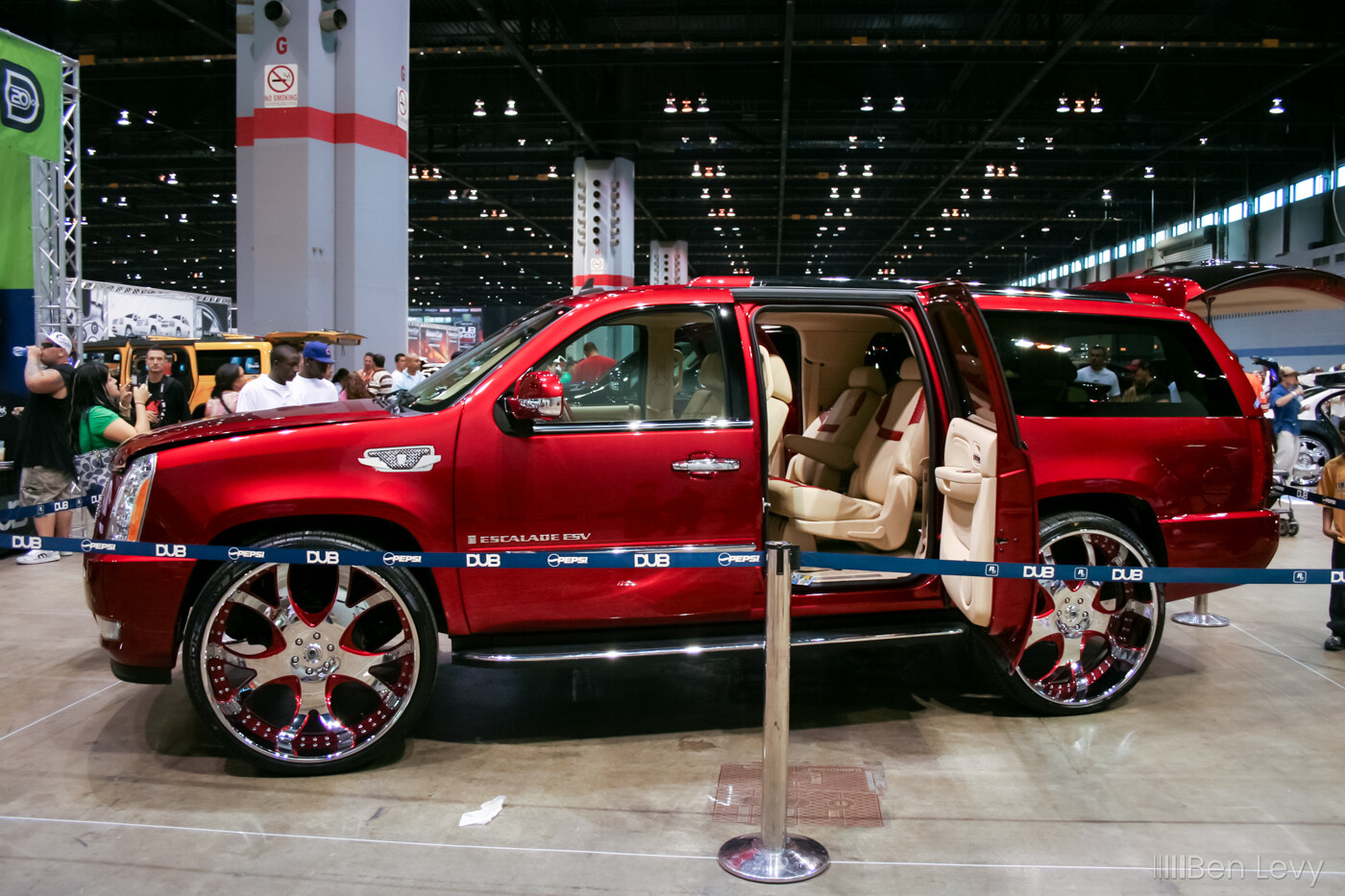 Red Cadillac ESV with suicide doors