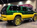 Green and Yellow Cadillac Escalade