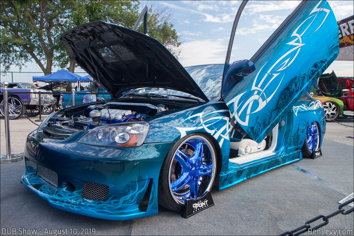 Low-rider Honda Civic with Tribal Graphics