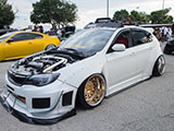 White Subaru WRX hatchback