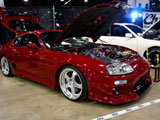 Red Toyota Supra with SSR Wheels