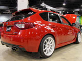 Red Subaru WRX hatchback