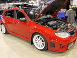 Red Subaru WRX hatchback