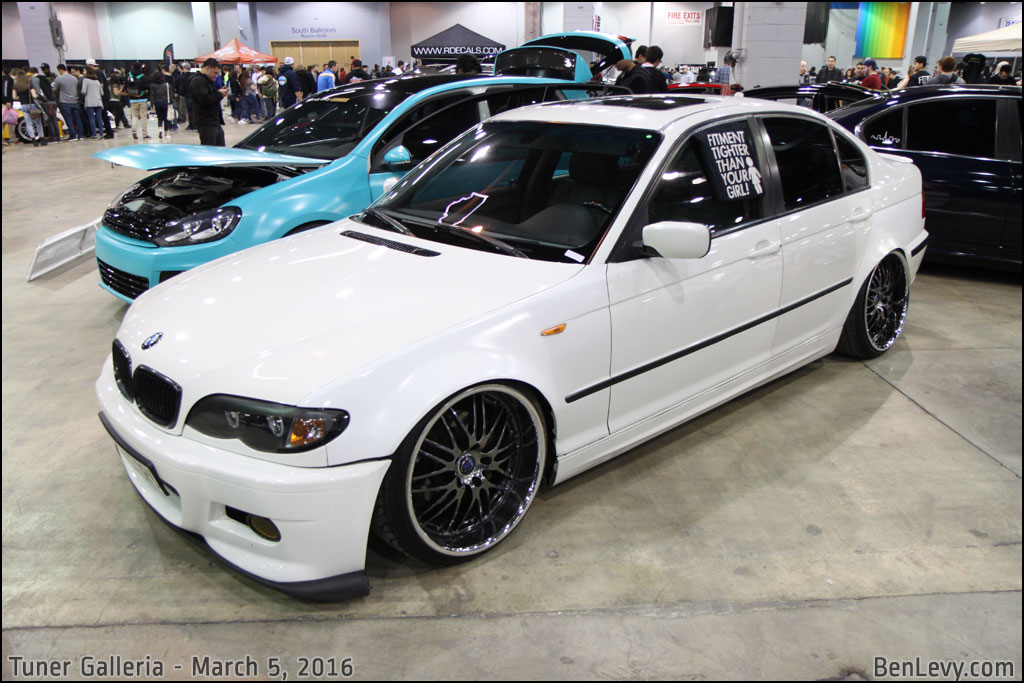 White BMW 3 series sedan