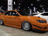 Orange Subaru WRX STI