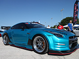 Teal Nissan GT-R